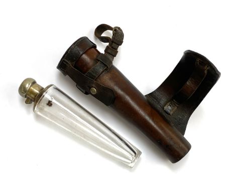 A conical glass hunting saddle flask, 19.5cmL, in a fitted leather case