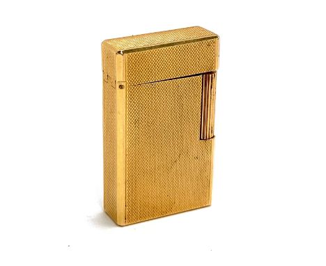 A Dupont Paris gold plated cigarette roller lighter, 5.7cmH