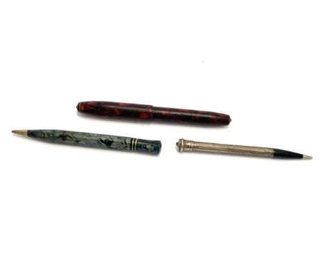 A Conway Stewart 14 red marble cased fountain pen with 14ct gold nib, together with a Conway Stewart Duro-Point no. 28 propel