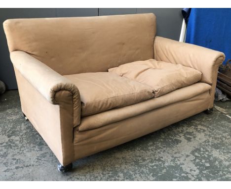 An early 20th century two seater sofa, horse hair stuffed with feather filled cushions, 165cmW