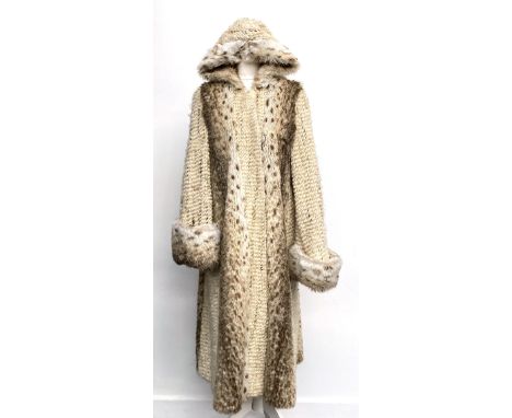 A vintage Astraka faux fur coat with hood, acrylic cotton wool blend, approx. size 12Provenance: from the wardrobe of The Lat