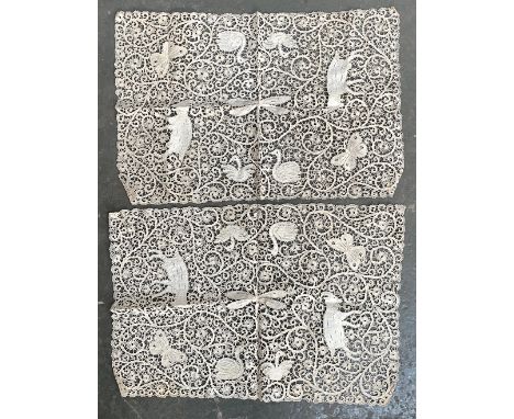 A pair of late 19th century Italian Cantu bobbin lace panels depicting butterflies, dragonflies, goats etc, 28x43cm