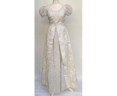 A vintage Regency style white silk and lace dress with iridescent ribbon detail, approx. size 10Provenance: from the wardrobe