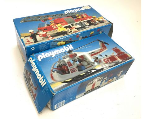 A Playmobil hook and ladder fire engine, model 3781, boxed, together with a white rescue helicopter, model 3789, boxed