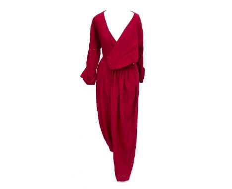 A vintage Droopy & Brown red wool trouser suit with button front panel, with self covered belt, size 10Provenance: from the w