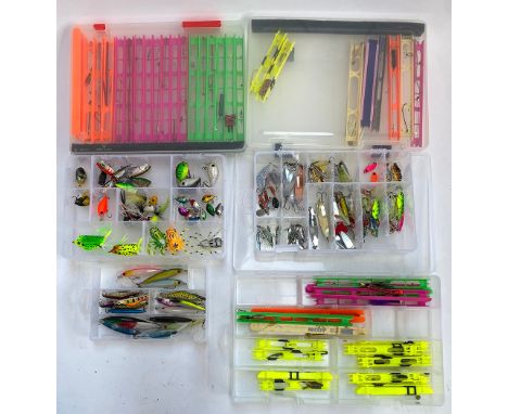 A quantity of sea fishing lures to include poppers, plugs, toby style lures, spoons, etc, and various rigs