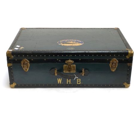 A vintage travel trunk, bearing stickers for the Cunard White Star line, 74cmW