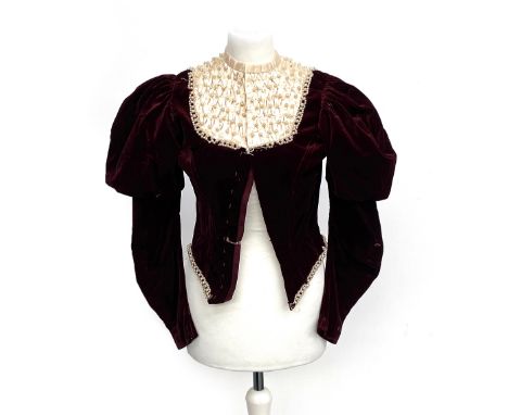 A vintage Tudor renaissance style silk and burgundy velvet bolero jacket with faux pearl detail, approx. size 8Provenance: fr