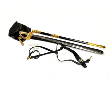 An Elizabeth II naval officer's sword by Henry Wilkinson, retailed by Gieves &amp; Hawkes, numbered 111183, with scabbard and