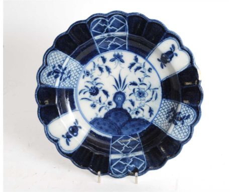 A Caughley powder-blue dish, painted in the Scholar’s Rock pattern (Holed or Flaming Rock), 1780 to 1785, of fluted form, dec