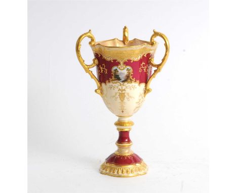 A Coalport three-handled tyg early 20th century, painted with a small scrolling cartouche lakeland scene against a lemon yell