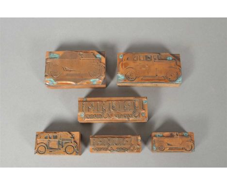 A small collection of early 20 th century automobile related copper printing blocks to include two graduating ‘Triumph Super 