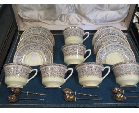A Royal Worcester Lady Evelyn pattern set of six cup and saucers with six silver spoons, cased  