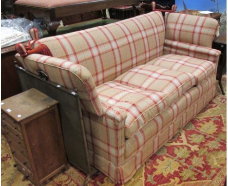 A Knole sofa, upholstered in a tartan fabric  