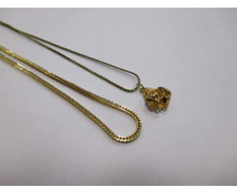 An 18ct gold chain (9.7g) together with a 9ct three stone emearld ring, size M, and another chain (3)  