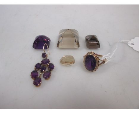 An 9ct gold and amethyst set dress ring, together with a single amethyst earring and loose gemstones  