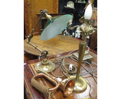 An early 20th century adjustable brass desk lamp, another lamp and a copper bugle (3)  