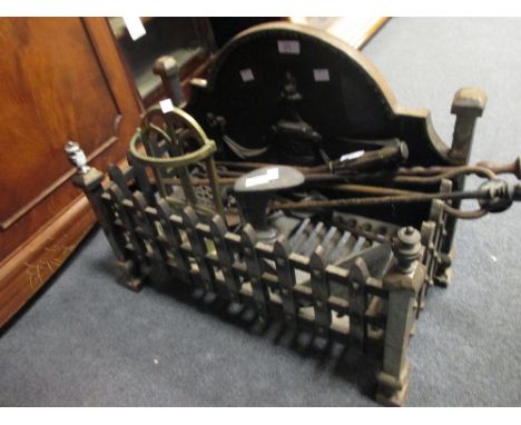 A fire basket and tools  