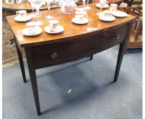 A George III mahogany bow fronted serving table, 71 x 92 x 50cm  