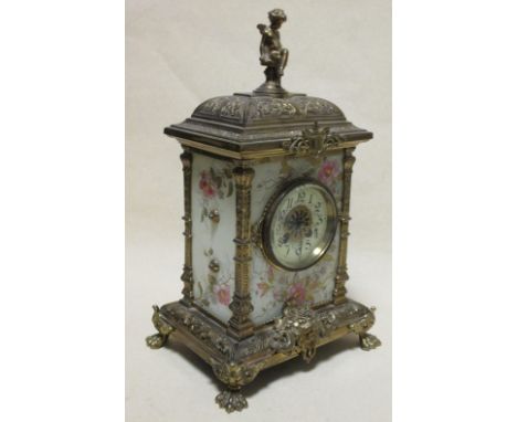 A late 19th Century gilt brass and painted porcelain mantle clock  