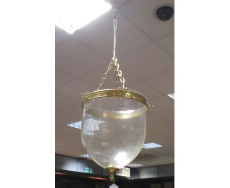 A large glass and brass mounted hanging lamp  