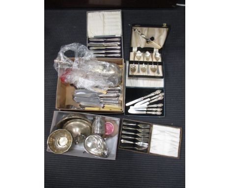 Please note this lot is subject to VAT. A silver ladle, two silver spoons and a quantity of plate and plated flatware includi