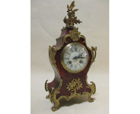 A mid 20th century tortoishell Rococco style eight day mantle clock  
