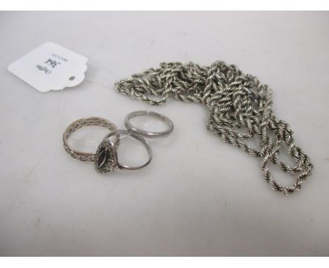 A platinum wedding band, 4.1g, a long rope chain stamped 'sterling; to clasp (1.3oz) and two other rings (4)  