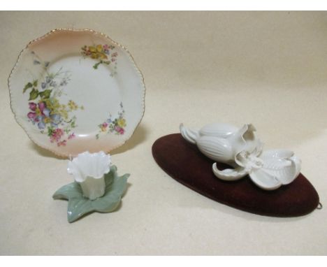 A Royal Worcester plate with floral painted decoration, circa 1898, a Worcester orchid wall bracket with mounting board and a