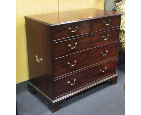 A 19th century mahogany chest of drawers, with two short and three long drawers, brass handles and bracket feet, later fitted