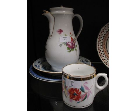 A continental hand painted coffee jug and a ceramic mug and three blue and white plates  