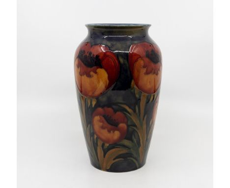 A Moorcroft Poppy pattern ovoid vase, circa 1920s, impressed marks and signed to base in blue, approx 21cm highCondition: goo