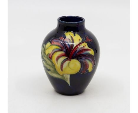 Moorcroft Hibiscus pattern baluster vase, marked to base, 9 cms tall approxCrazed but otherwise in good condition 