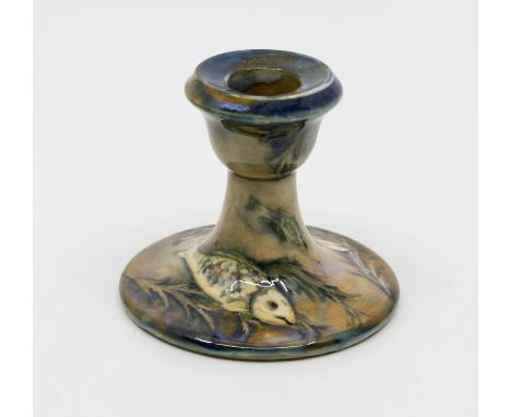 A Moorcroft Fish pattern squat candlestick, circa 1920s, impressed marks and signed to base in green, approx 8cm highConditio