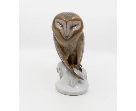 A large Royal Copenhagen owl figurine, number 273, marked to base, first quality, 22 cms tall approx In very good condition 