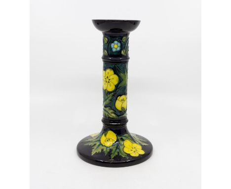 A Moorcroft yellow flower pattern candlestick, contemporary, impressed marks and initials to base, approx 21cm highCondition: