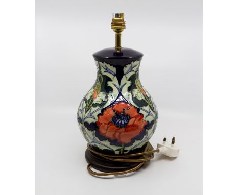 Moorcroft Poppy pattern table lamp, 34 cms tall approx including fittingsVery few craze lines, otherwise in good condition 