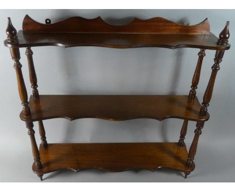 A Mahogany Three Tier Wall Shelf, 58cm Wide 