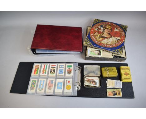 A Vintage Huntley and Palmer "Britannia" Empire Assorted Biscuit Tin Containing Various Part Sets of Cigarette Cards Together