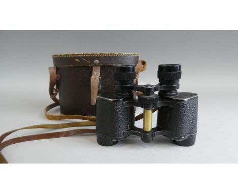 A Vintage Pair of Leather Cased "Lumalite" 8 x 30 Binoculars 