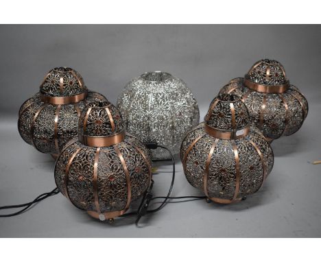 A Collection of Three Modern Islamic Style Metal Light Shades and Two Similar Table Lamps 