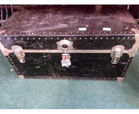 A metalbound travel trunk. 