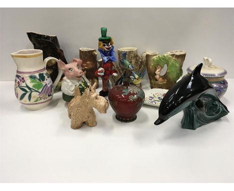 Various china items to include Poole pottery (af), Sylvac, Fauna, Wade and a Murano style clown.