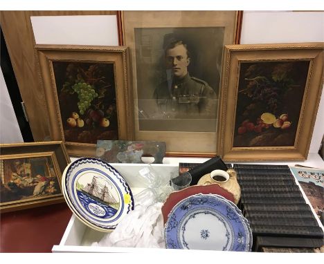 Various pictures, books, two Poole plates with other items.
