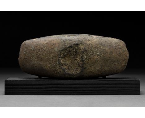 Ca. 5000–3000 BC. Neolithic, Northern European. A nice ground axe head with a central socket and two crescent moon-shaped bla