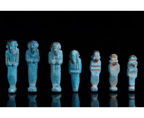 Ca. 664 - 332 B.C. Late Dynastic Period to Ptolemaic Period. Egyptian. An ancient Egyptian mummiform ushabti group wearing a 