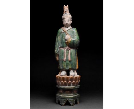 Ca. 1368–1644 AD. Ming Dynasty. An elaborate male figure with beautifully glazed pigment. The man is standing with his feet a