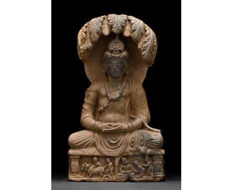 Ca. 200–300 AD. A grey chlorite-schist statue of Prince Siddhartha Gautama meditating beneath the Jambu tree. The figure is s