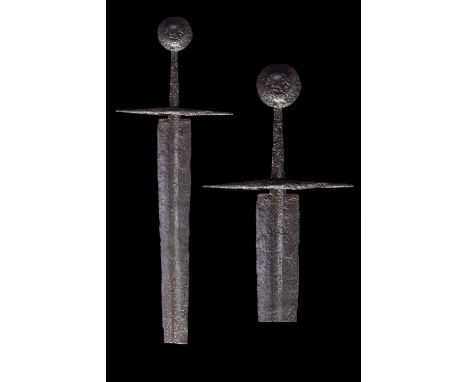 Ca. 700-1000 AD. Viking age. An iron sword with ad doubled-edged blade, broken off from the half and a wide, broad, tapering 