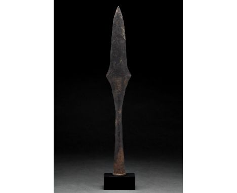 Ca. 1000–1200 AD. Viking Age. An iron spearhead with a leaf-shaped blade, sharp edges flaring halfway through the blade befor